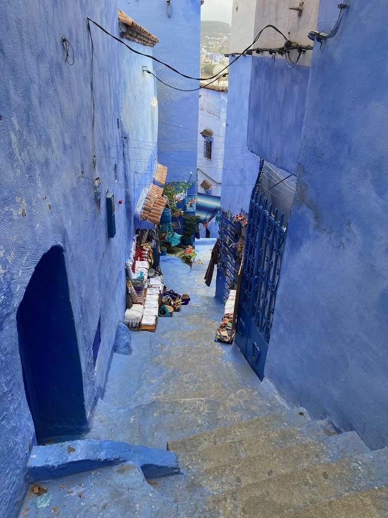 looking down the blue steps in an alley