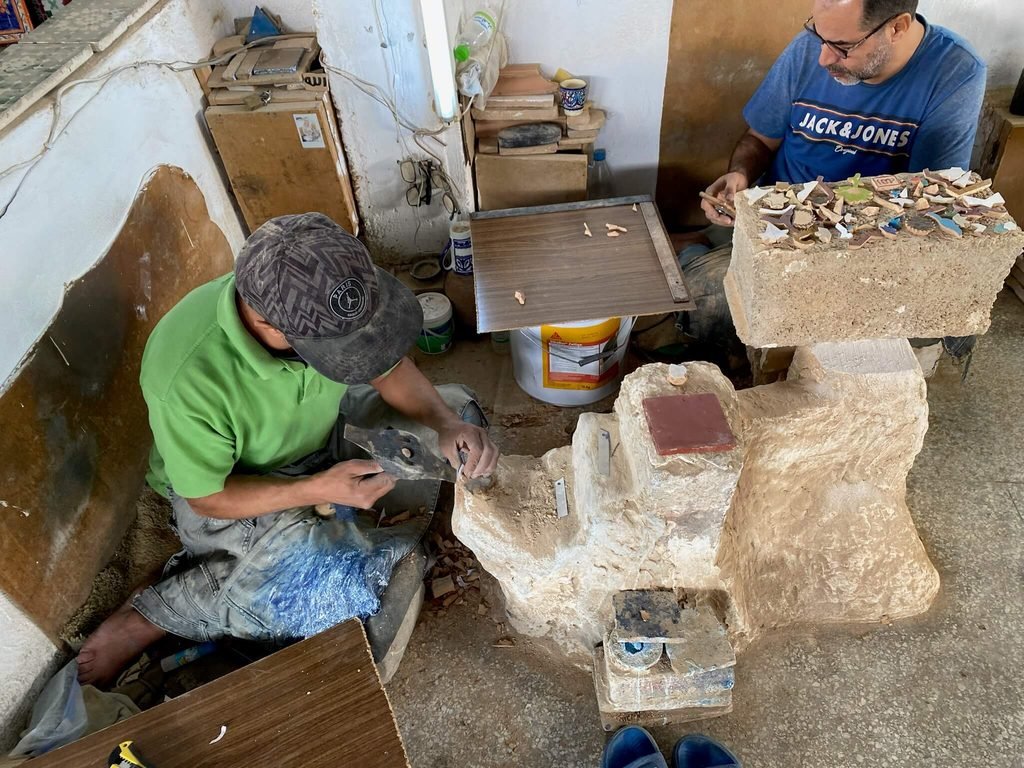 moroccan workers creating the pottery