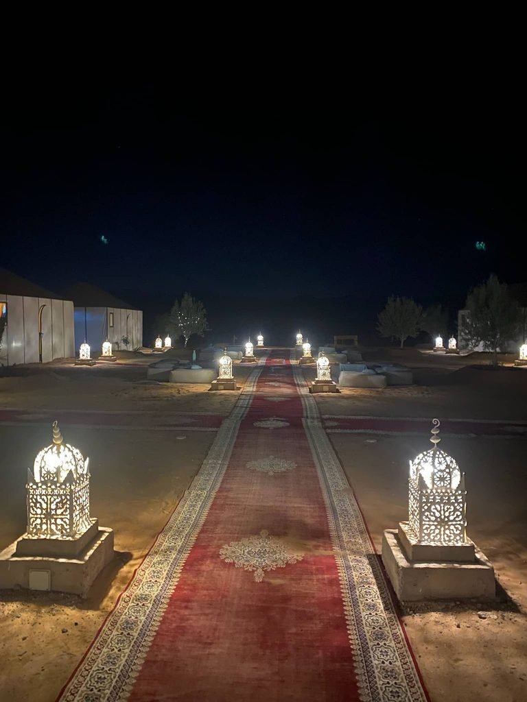 lit up walk ways in the camp