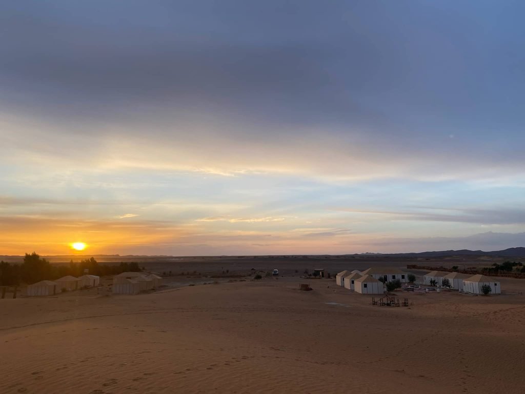 sun rise over campsite in the sahara