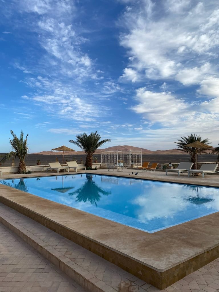 pool next to the sahara with blue sky