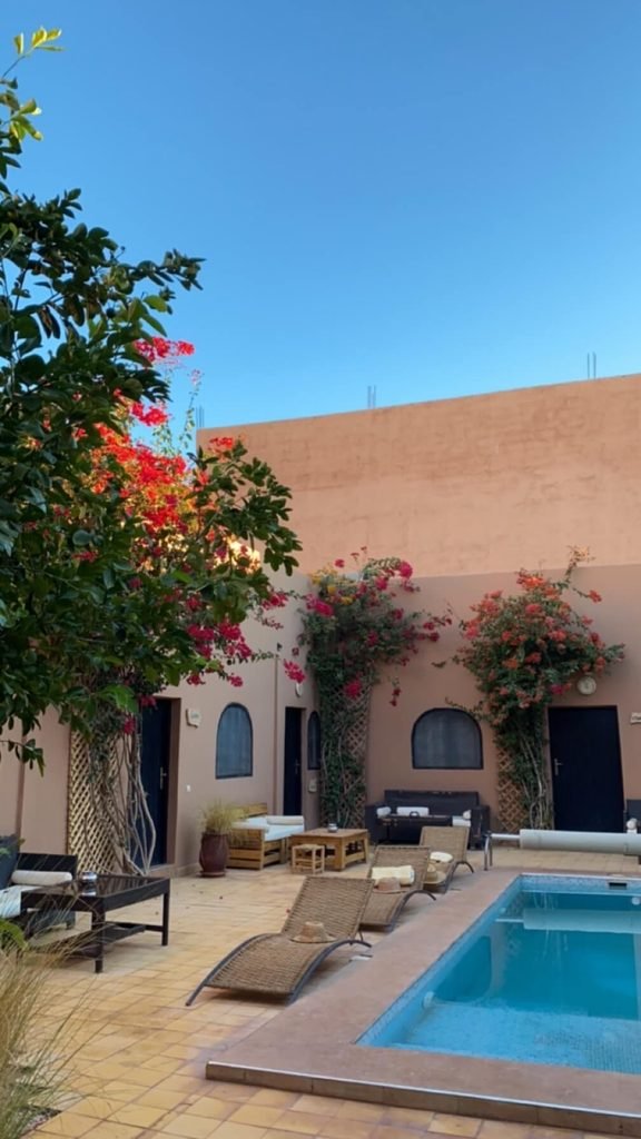 Hotel rooms around a pool