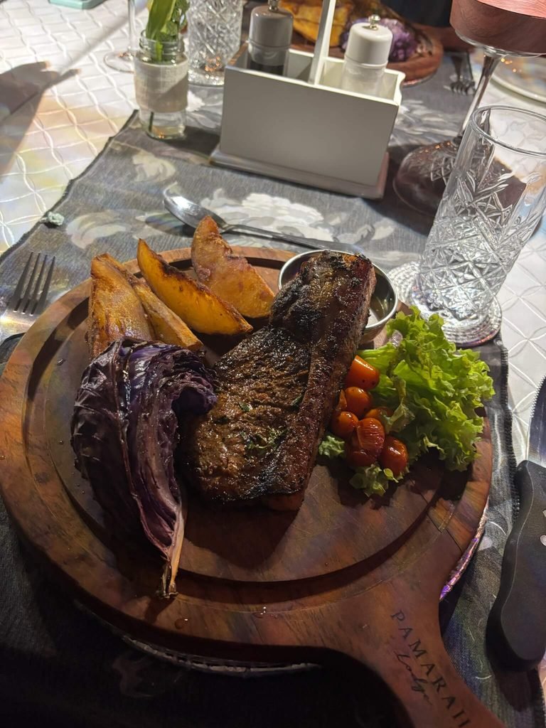 steak and chips on a wooden board