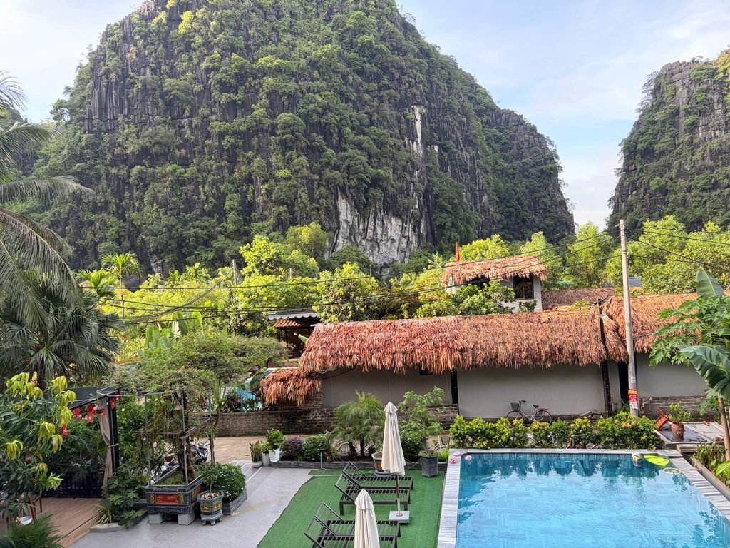 view of hotel pool and limestone karsts