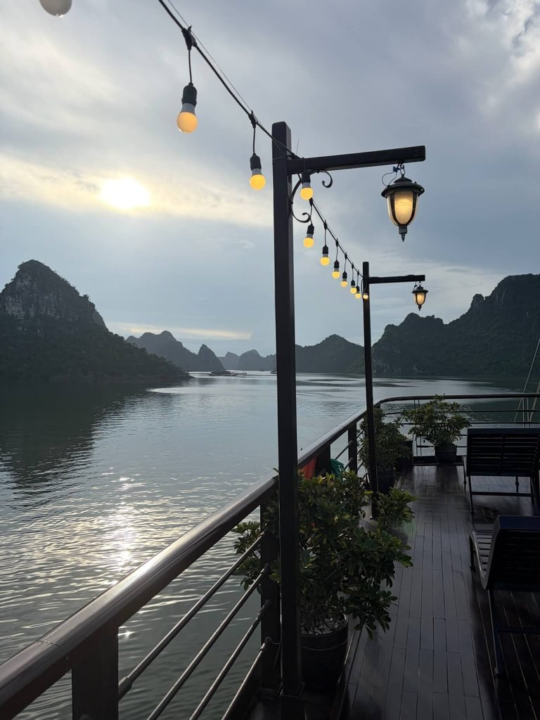view of deck and lights with view over sea