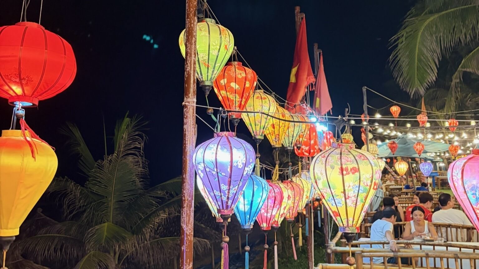 lanterns above restaurant in the evening
