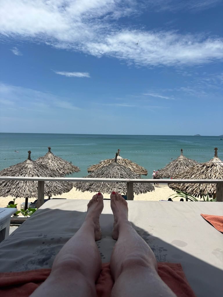 sunbathing looking onto beach